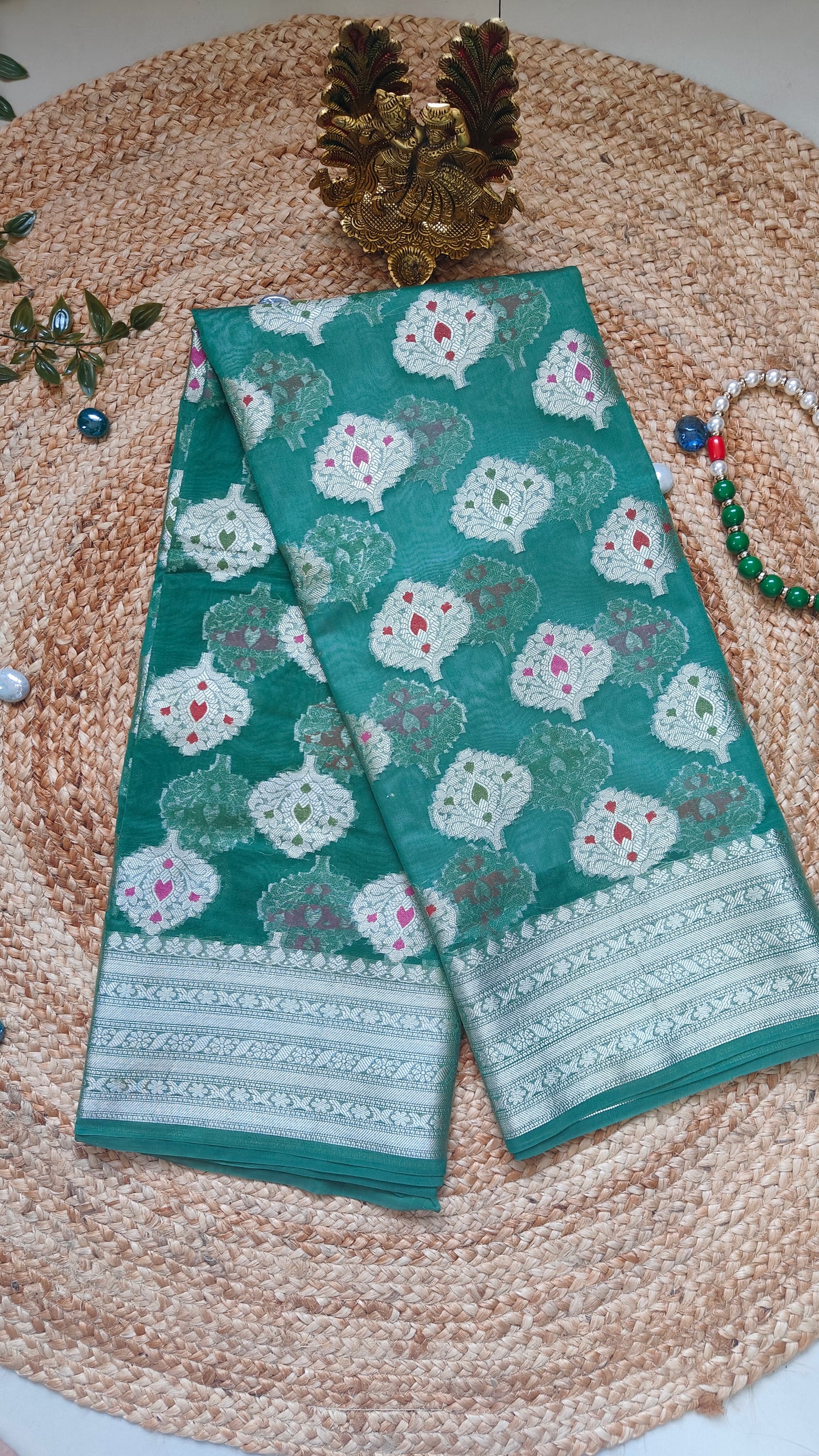 PISTA GREEN SEMI GEORGEETE SAREE WITH MEENA BUTTTA